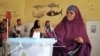 A woman casts her vote in the presidential election in Hargeisa, in the semi-autonomous region of Somaliland, Nov. 13, 2017.