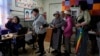 Voters register at a polling station in Ulaanbaatar, Mongolia, on June 28, 2024. Voters in Mongolia are electing a new parliament on Friday in their landlocked democracy that is squeezed between China and Russia, two much larger authoritarian states