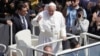 Pope Francis waves to the crowd after celebrating Easter Sunday Mass, in St. Peter's Square, at the Vatican, April 16, 2017. 