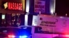 Pihak berwenang menyelidiki penembakan fatal di sebuah spa di Acworth, Georgia, Atlanta, Selasa, 16 Maret 2021. (AP Photo/Mike Stewart)
