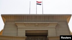 The Egyptian flag is seen atop the Supreme Constitutional Court building in Cairo, July 4, 2013.