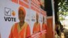 Campaign posters for women's representative candidate in downtown Mombasa, February 21, 2013. (VOA/Jill Craig)