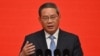 China's Premier Li Qiang delivers a speech during the China Developm.ent Forum in Beijing, March 24, 2024. After days of delay, Li congratulated new British Prime Minister Keir Starmer on his election.