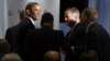 U.S. President Barack Obama (L) shakes hands at the Business Roundtable in Washington, where he renewed his call for tax hikes on the wealthiest 2 percent of Americans and for an increase in the nation's borrowing limit, December 5, 2012.