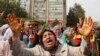 Protesters chant slogans as they protest Saturday's bombing attacks, during a rally in Ankara, Oct. 11, 2015. 