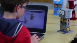 Children Learn to Program Toy Robots