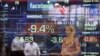 Television correspondent Sabrina Quagliozzi reports from inside the Nasdaq MarketSite in New York's Times Square, May 21, 2012.