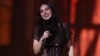 Charli XCX receives the award for artist of the year during the BRIT Awards at the O2 Arena in London, March 1, 2025.