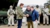 Defense ministers Antti Hakkanen of Finland, Bjorn Arild Gram of Norway and Pal Jonson of Sweden gather near the borders of all three countries, in Kilpisjarvi, Finland, on March 9, 2024.