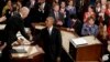 President Barack Obama shakes hands with Vice President Joe Biden after giving his State of the Union address before a joint session of Congress on Capitol Hill in Washington, Jan. 12, 2016.