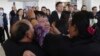 Thai hostage who were freed from Hamas, Bannawat Saethao, second from left, hugs his relatives of upon his arrival at Suvarnabhumi International Airport, in Samut Prakarn Province, Thailand, Feb. 9, 2025.