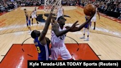 Krilni košarkaš Toronta Paskal Sijakam (43) u duelu sa Drejmondom Grinom u prvoj utakmici finala NBA plej-ofa u Torontu (Foto: Reuters/Kyle Terada-USA TODAY Sports)