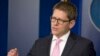White House press secretary Jay Carney answers questions during his daily news briefing at the White House, March 10, 2014. 