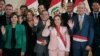 President of Peru Dina Boluarte poses with her newly appointed state ministers after a swearing in ceremony in Lima, Peru April 1, 2024.