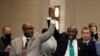 Philonise Floyd (left), who is the brother of George Floyd, and attorney Ben Crump react during a news conference after the guilty verdict was read in the trial of former Minneapolis police officer Derek Chauvin, April 20, 2021, in Minneapolis.