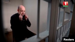 Rico Krieger, a German sentenced to death on terrorism and other charges, attends an interview with Belarusian state TV at an unidentified location, in this still image from video released July 25, 2024. (Belteleradio Company via Reuters)