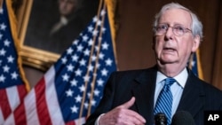 FILE - Senate Republican Majority Leader Mitch McConnell speaks during a news conference at the Capitol in Washington, Dec. 8. 2020.