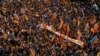 Pro-Unity Spaniards March with Facetious Movement in Barcelona