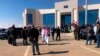FILE - Iraqi and Saudi officials open the Arar border crossing, in Anbar, Iraq, Nov. 18, 2020. 