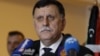 FILE - Libyan prime minister-designate under a proposed national unity government, Fayez Saraj, attends a news conference in Tunis, Tunisia, Jan. 8, 2016. 