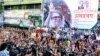 FILE - Supporters of Bangladesh’s main opposition party of BNP demand that their leader former PM Khaleda Zia be allowed to travel outside the country for medical treatment, during a protest in Dhaka, Nov. 30, 2021.