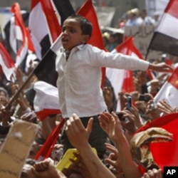 Des manifestants de la place Tahrir, au Caire