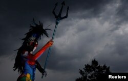 A model performs on stage during the "World Bodypainting Festival 2017" in Klagenfurt, Austria, July 28, 2017.
