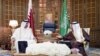 Sheikh Tamim bin Hamad Al-Thani, Amir of Qatar (l) meets with Saudi King Salman at the Riyadh airport in Saudi Arabia, Feb. 17, 2015.