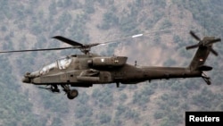 Helikopter NATO yang sedang menjalankan tugas di provinsi Kunar, Afghanistan (foto: dok). Serangan udara NATO di Kunar menewaskan 9 warga sipil. 