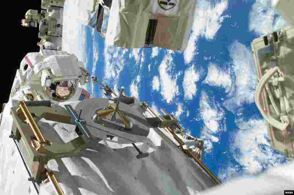 NASA astronaut Rick Mastracchio participates in the first Expedition 38 spacewalk designed to troubleshoot a faulty coolant pump on the International Space Station.