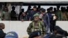 Former members of the Armed Forces of the Democratic Republic of Congo and police officers who allegedly surrendered to M23 rebels arrive in Goma, Congo, Feb. 23, 2025. President Felix Tshisekedi said he is going to launch a unity government.