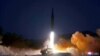 FILE - This picture taken on Jan. 11, 2022, and released by North Korea's official Korean Central News Agency on Jan. 12, 2022, shows what North Korea says a hypersonic missile test-firing conducted by the Academy of Defense Science of the DPRK at an undisclosed location.