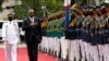 U.S. Defense Secretary Lloyd Austin, second from left, walks past military guards during his arrival at the Department of National Defense in Camp Aguinaldo military camp in Quezon City, Metro Manila, Philippines on Thursday February 2, 2023. 
