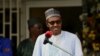 FILE - Nigeria's President Muhammadu Buhari speaks during a news conference after the Summit of Heads of State and Government of The Lake Chad Basin Commission (LCBC) in Abuja, Nigeria, June 11, 2015.