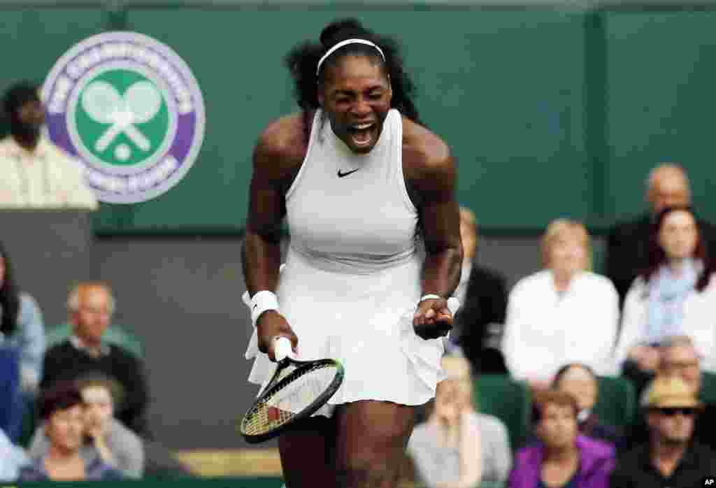 Serena Williams of the U.S celebrates a point against Christina McHale of the U.S during their women's singles match on day five of the Wimbledon Tennis Championships in London.