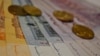 Jawi script is featured on Malaysian bank notes. (Photo: Zsombor Peter / VOA) 