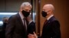 Attorney General Merrick Garland speaks with Homeland Security Secretary Alejandro Mayorkas as they arrive for a hearing on "Domestic Violent Extremism in America." before the Senate Appropriations Committee on Capitol Hill in Washington, May 12, 2021.