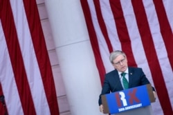 FILE - Daniel Mulhall, Ireland's ambassador of to the U.S., speaks during an event at Arlington National Cemetery in Virginia, June 6, 2018.