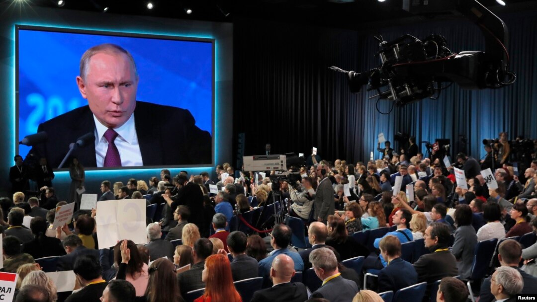Russian President Vladimir Putin speaks during annual news conference in Moscow, Russia, Dec. 20, 2018. 