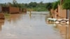 Une rue inondée du quartier Kirkissoye à Niamey, dont plusieurs quartiers sont dévastés par les inondations provoquées par l'exceptionnelle marée haute du fleuve Niger, le 3 septembre 2019. - . (Photo par BOUREIMA HAMA / AFP)