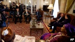 Libyan Foreign Minister Mohamed Taher Siala, top center, attends a ministerial meeting of countries neighboring Libya, in Cairo, Egypt, Jan. 21, 2017. Also in attendance was United Nations envoy Martin Kobler, third right.
