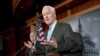  Sen. John Cornyn, R-Texas, right, accompanied by Sen. John McCain, R-Ariz., gestures during a news conference on Capitol Hill in Washington, Tuesday, June 26, 2012