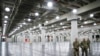 U.S. National Guard members stand at the Jacob Javits Center, March 23, 2020, in New York.
