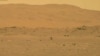 FILE - In this image from NASA, NASA's experimental Mars helicopter Ingenuity lands on the surface of Mars Monday, April 19, 2021. 