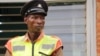 Kanduwa Sande is a police officer with a greater passion for sports. (Lameck Masina/VOA)