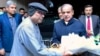 Pakistan's newly sworn-in Prime Minister Shehbaz Sharif, second from right, greets newly elected President Asif Ali Zardari, fourth from right, in Islamabad on March 9, 2024. (Pakistan's Press Information Department via AFP)