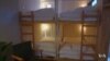 Tiny, Noisy Rooms Draw Customers to Japan Hostel