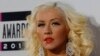 Musician Christina Aguilera arrives at the 41st American Music Awards in Los Angeles, California, Nov. 24, 2013.