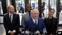 Steve Greenberg, R. Kelly's defense attorney, smiles as he responds to a question after Kelly pleaded not guilty on 11 new sex-related felonies in Chicago, June 6, 2019. 