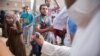Egyptian supporters of the Muslim Brotherhood movement carry the body of Hossam Al-Akabawi, a comrade who died during clashes with Egyptian police following a march after the morning prayers for Eid al-Fitr, July 17, 2015 in the village of Nahya near Cairo.